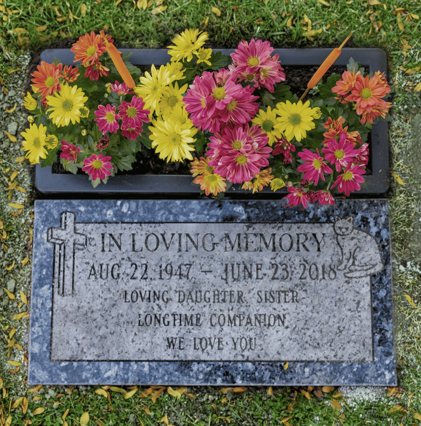 Floweverbox above a gravestone